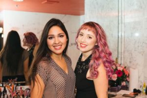two Cupcake Girls volunteers smiling