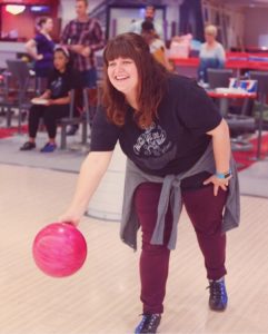 happy girl bowling